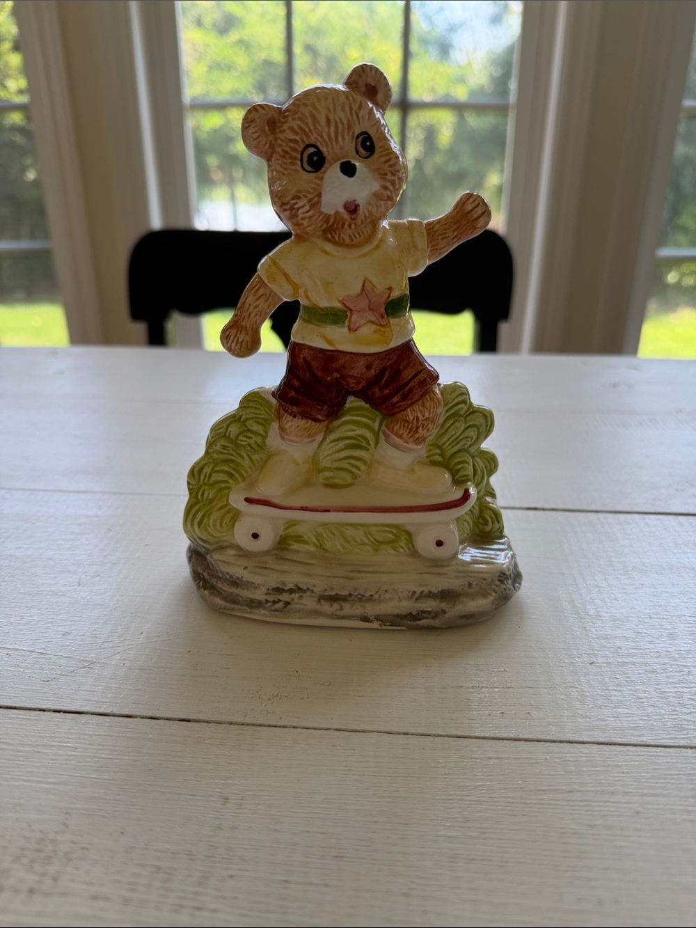 Vintage 1991 Loomco ceramic figurine featuring a teddy bear riding a skateboard.
